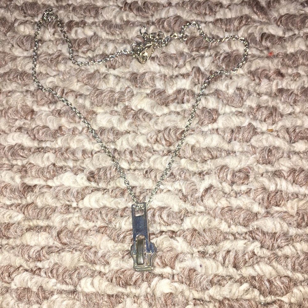 A silver zipper necklace!